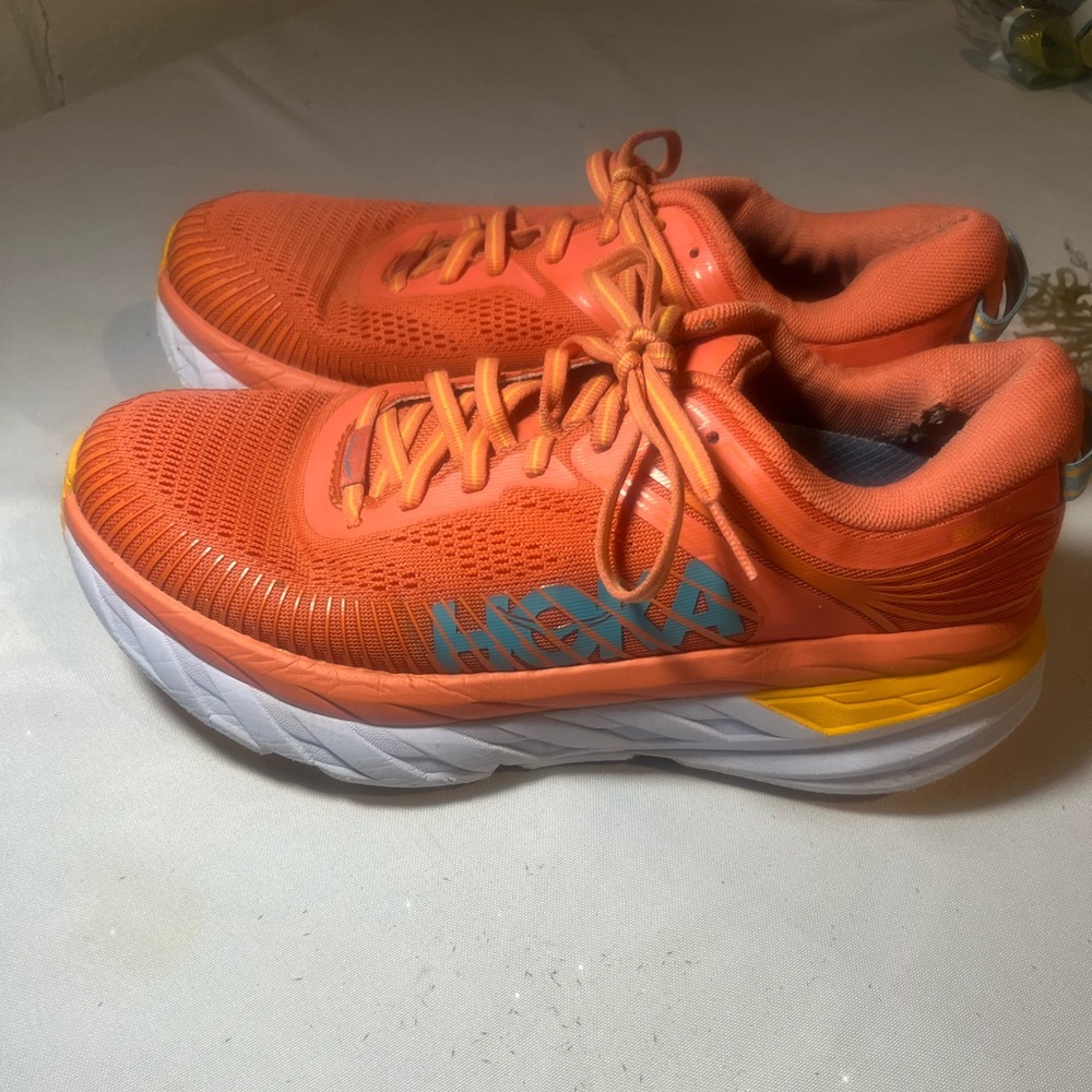 Hoka women’s Vibrant Orange Sneakers